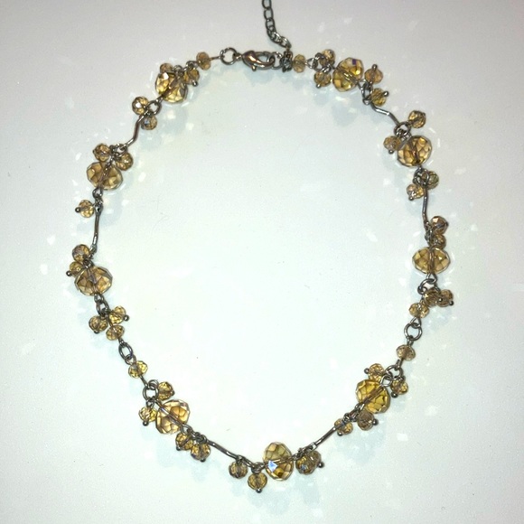 Lightly Tinted Gold Beaded Necklace with a small dangle. - Picture 1 of 4